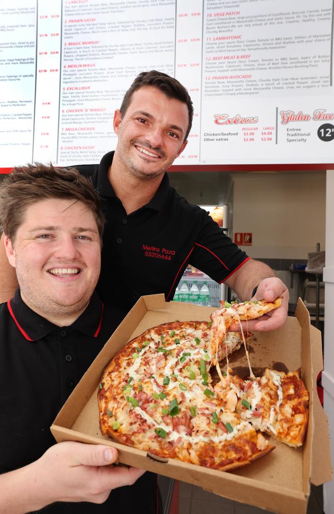 Merlins Pizza has been named the best on the Gold Coast. Co-owners Jordan Powell and Scott Jelich with some of their tasty treats. Picture Glenn Hampson