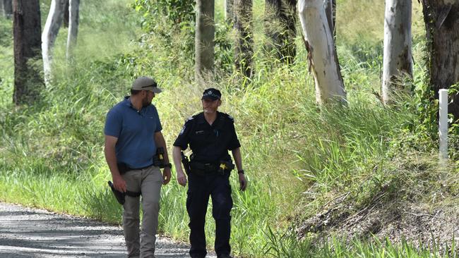 Police comb bushland near the Frayne Rd property where 22-year-old Michael Zanco was shot dead last Thursday night.