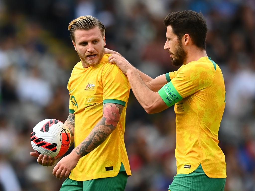 Jason Cummings (left) and Mathew Leckie will be part of the Socceroos’ attacking arsenal in Qatar. Picture: Hannah Peters/Getty Images