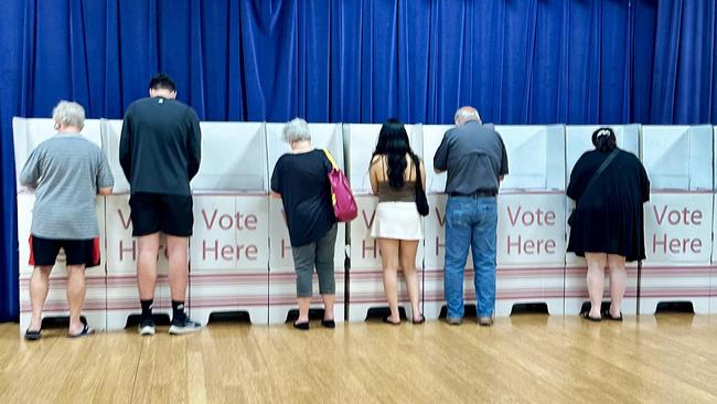 Pre-Polls - Generic polling booth picture. People voting (Southport Community Centre).NO BYLINE