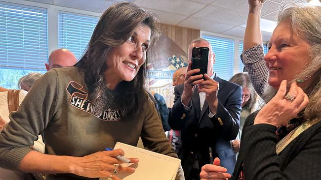 Nikki Haley chats with a supporter after the town hall in Laconia. Picture: AFP