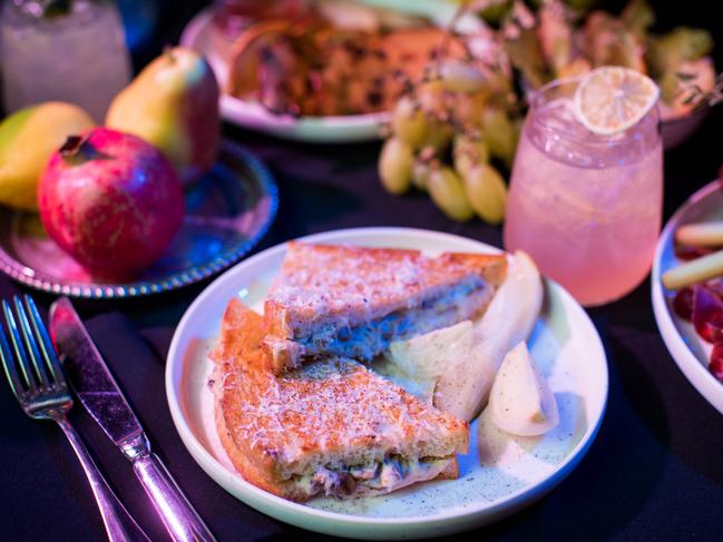 Hanging Garden cocktail with truffle croque monsieur at the Spellbound pop-up bar. Picture: Anna Kucera