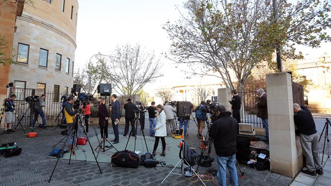 The huge media gathering on the corner of Angas St and King William St. Picture: Daniel Kalisz/Getty Images