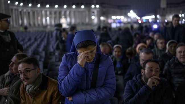 The faithful pray for the health of Pope Francis during a rosary prayers led by Vatican State Secretary Pietro Parolin at St Peter's Square. Picture: Getty Images