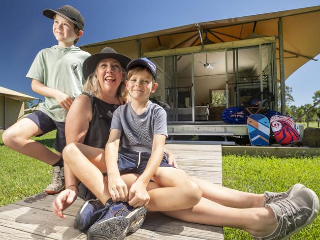 Belinda McDonnell from Eumundi with sons Hudson, 9, and Noah, 7, at a glamping tent at Habitat Noosa campground at Lake Cootharaba. Picture: Lachie Millard