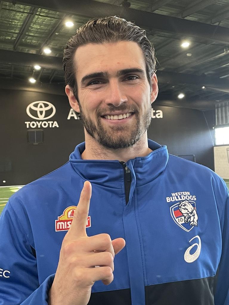 Western Bulldogs player Easton Wood holding up one finger in support of the DonateLife’s 'one minute' social media campaign.