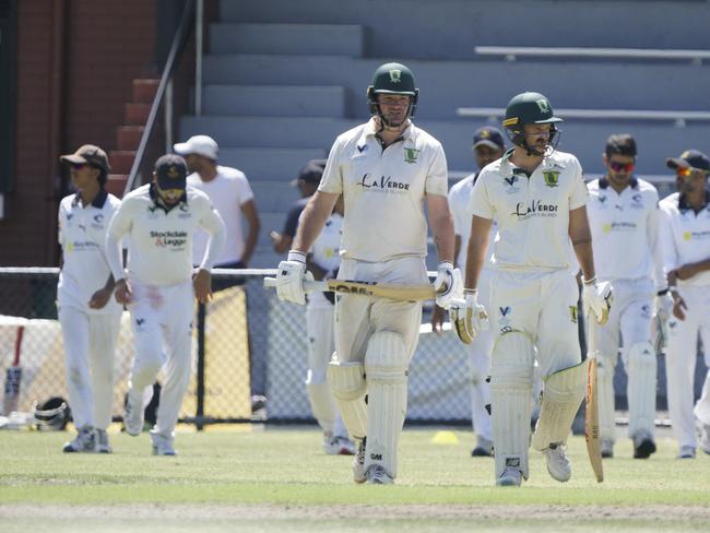 Cricket Southern Bayside, Division 1: Carnegie v Parkdale United played at Koornang Park, Carnegie. Parkdale batters Leigh Heinrichs and Calum Ravesi walk on the ground after tea. Picture: Valeriu Campan