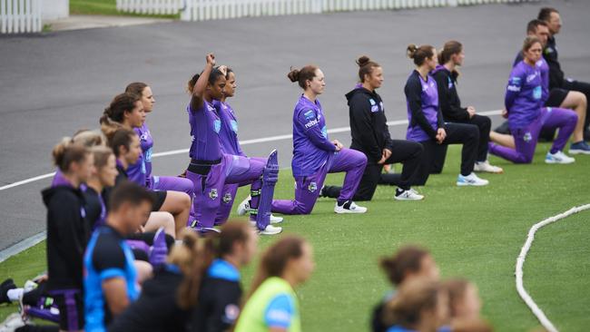 Players take a knee prior to the Women's Big Bash League match between the Adelaide Strikers and the Hobart Hurricanes at Hurstville Oval, on October 25, 2020, in Sydney, Australia. (Photo by Brett Hemmings – CA/Cricket Australia via Getty Images)