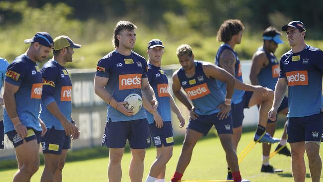 Jai Arrow (centre) looks on during an NRL Titans training session at the Titans High Performance Centre. Picture: AAP Image/Dave Hunt