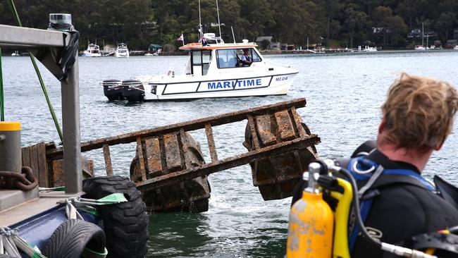 The recovery of material from Pittwater, off Scotland Island. Photo Manly Daily