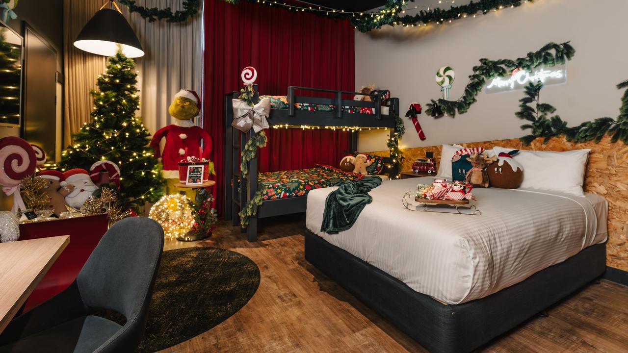 One room features Christmas-themed bunk beds, a life-sized Grinch, and a huge sleigh. Picture: Supplied