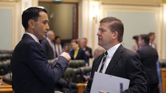 Queensland Opposition Leader David Crisafulli speaks with LNP committee chairman Jon Krause during parliament question time in Brisbane. Picture: NewsWire/Tertius Pickard