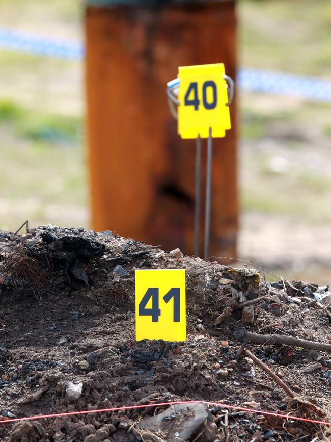 Police markings for evidence in their Bagdad search for clues.