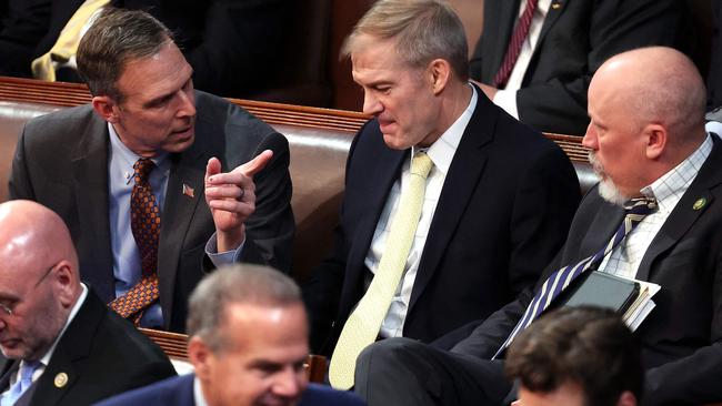 Scott Perry, Jim Jordan, and Chip Roy talk in the House Chamber during the second day of elections for Speaker of the House. Picture: Getty Images via AFP.