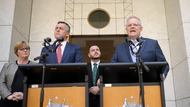 Prime Minister Scott Morrison announces the appointment of a permanent independent commissioner to investigate veteran suicide with (L-R) Australian Defence Minister Linda Reynolds, Australian Veterans' Affairs Minister Darren Chester and Liberal member Herbert Philip Thomson at Parliament House on February 05, 2020. (Photo by Tracey Nearmy/Getty Images)