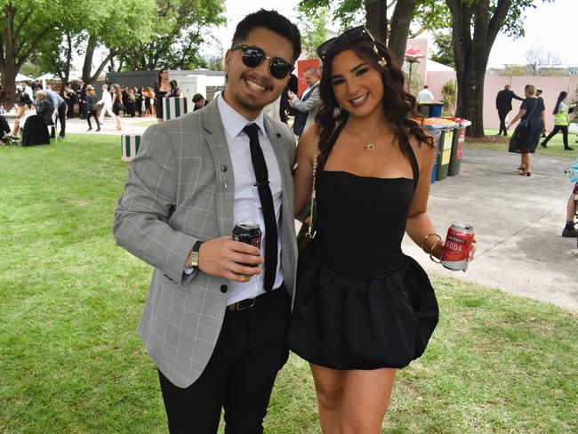 Guests in striking racewear at Penfolds Derby Day at the Flemington Racecourse on Saturday, November 02, 2024: Giorgio Marinis and Alisa Gray. Picture: Jack Colantuono