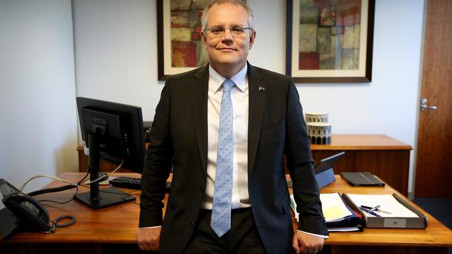 *Treasurer Scott Morrison in his office at Treasury in Canberra. Picture Kym Smith