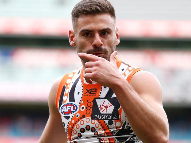 MELBOURNE, AUSTRALIA - MAY 26: Stephen Coniglio of the Giants celebrates a goal during the 2019 AFL round 10 match between the Melbourne Demons and the GWS Giants at the Melbourne Cricket Ground on May 26, 2019 in Melbourne, Australia. (Photo by Michael Willson/AFL Photos)