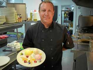 NEW MENU: Nathan McLellan, executive chef of BC's Bar and Grill, Roma, introduces a deconstructed mango and strawberry cheesecake to the new menu. Picture: Jorja McDonnell