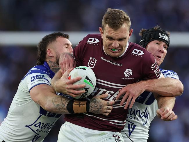 SYDNEY, AUSTRALIA - SEPTEMBER 15: Tom Trbojevic of the Sea Eagles charges forward during the NRL Qualifying Final match between Canterbury Bulldogs and Manly Sea Eagles at Accor Stadium on September 15, 2024 in Sydney, Australia. (Photo by Cameron Spencer/Getty Images)