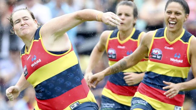 Sarah Perkins celebrates in trademark fashion after a vital goal for the Crows. Picture: Sarah Reed