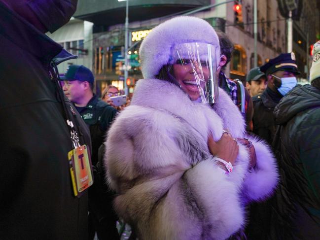 Singer Ashanti walks past the crowd after her performance at Times Square. Picture: Getty