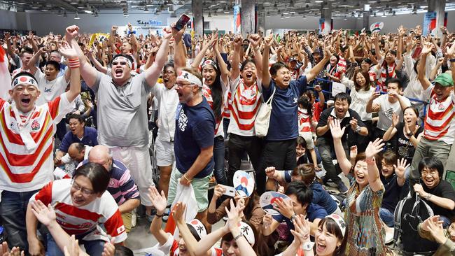 Japan's rugby team has given their fans something to cheer after a horror week away from the pitch. Picture: Kyodo News via AP