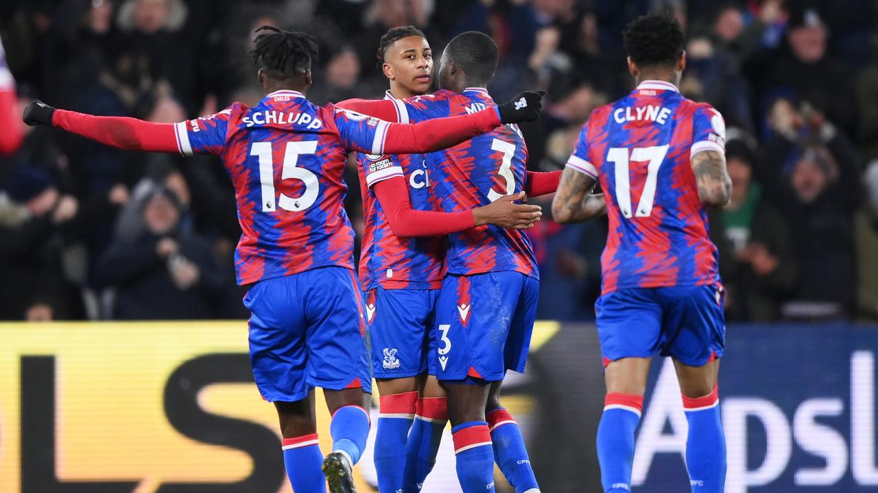 LONDON, ENGLAND - JANUARY 18: Michael Olise of Crystal Palace celebrates after scoring the team's first goal from a free kick with teammates during the Premier League match between Crystal Palace and Manchester United at Selhurst Park on January 18, 2023 in London, England. (Photo by Justin Setterfield/Getty Images)