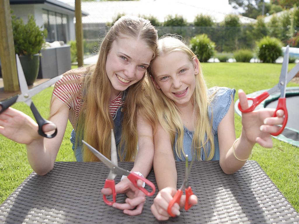 Sisters Matilda and Harriet Stepto are fundraising in memory of their dad Nigel who died a year ago this week. Picture: Alan Barber