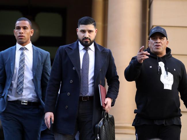 A high-profile lawyer, Mr Abbas walks out of Central Local Court with Will Hopoate and John Hopoate. Picture: NCA NewsWire