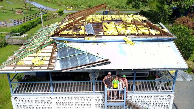 Simpson family on the balcony of their cyclone Debbie damaged Proserpine home. Photographer: Liam Kidston