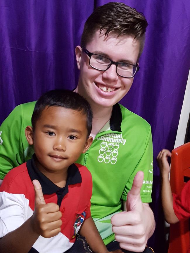 Ben Heard helping out in the Hope Village orphanage and school in Indonesia.