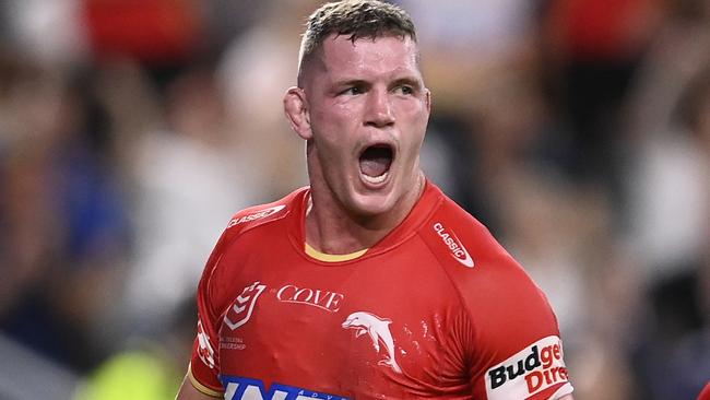 TOWNSVILLE, AUSTRALIA - APRIL 07: Tom Gilbert of the Dolphins celebrates after scoring a try during the round six NRL match between North Queensland Cowboys and Dolphins at Qld Country Bank Stadium on April 07, 2023 in Townsville, Australia. (Photo by Ian Hitchcock/Getty Images)