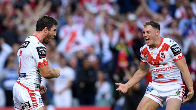 Ben Hunt of the Dragons (left) celebrates with Kurt Mann after scoring a try during the Round 8 NRL match between the St George Illawarra Dragons and the Sydney Rooster at Allianz Stadium in Sydney, Wednesday, April 25, 2018. (AAP Image/Dan Himbrechts) NO ARCHIVING, EDITORIAL USE ONLY