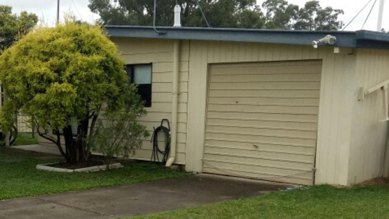 The squatter refused to leave the Caboolture garage. Picture: The Courier-Mail