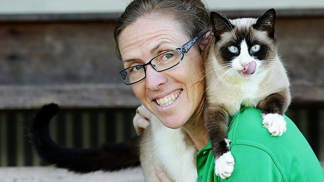 Milo the cat will star in the new John Jarrett film, "Stalkher" pictured with Owner Ros Taber and children Alex 12 and Belynda 10. Pic Mark Calleja