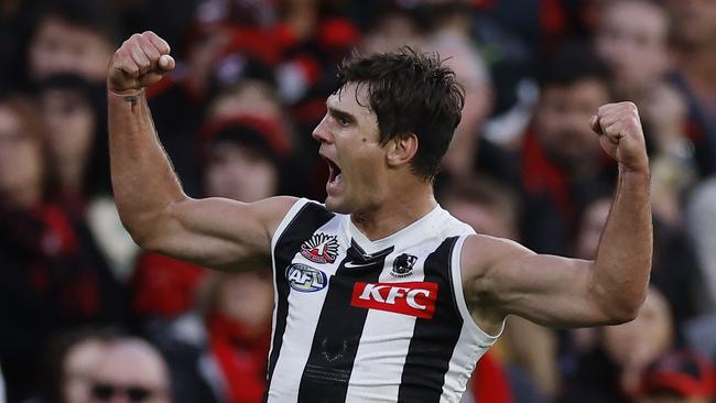 MELBOURNE , AUSTRALIA. April 25, 2024.  AFL.. Anzac Day.  Essendon vs Collingwood at the the MCG.   Lachie Schultz of the Magpies celebrates a 3rd quarter goal   . Pic: Michael Klein