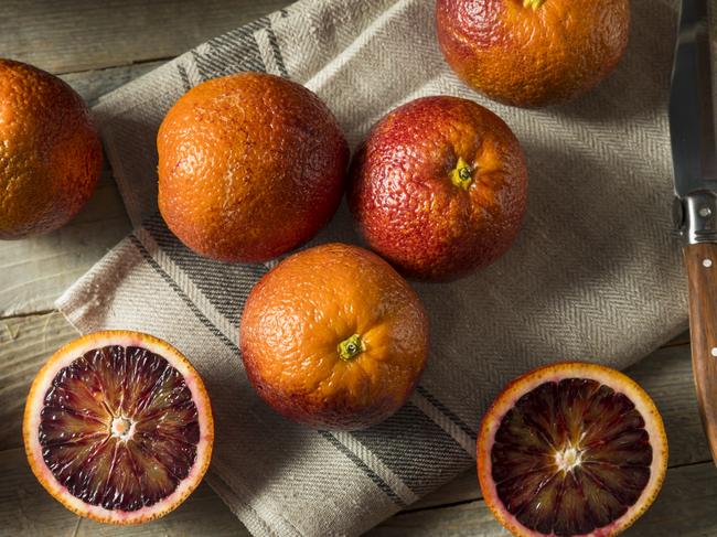 EMBARGO FOR TWAM 22 APRIL 2023. FEE MAY APPLY. Raw Red Organic Blood Oranges stock photo, Blood Orange, Backgrounds, Blood, Bright, Circle. Photo: Supplied