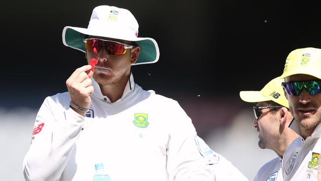 South Africa’s Kyle Abbott inspects a red lolly. Picture: Wayne Ludbey.