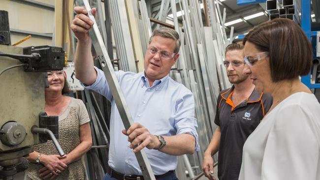 Queensland LNP leader Tim Nicholls, deputy leader Deb Frecklington and member for Mount Ommaney Tanya Smith are taken on a tour of ESP Fencing &amp; Security.