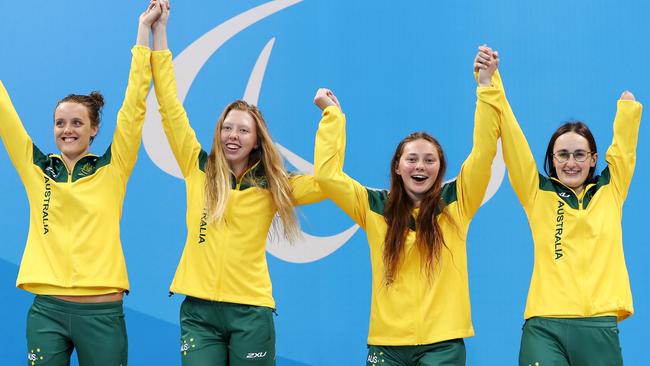 Ashleigh McConnell (right) and fellow gold medallists Ellie Cole, Lakeisha Patterson and Maddison Elliot after receiving their gold medals. Picture: Hagen Hopkins/Getty Images