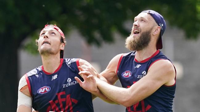 Max Gawn and Braydon Preuss tussle at Melbourne training.