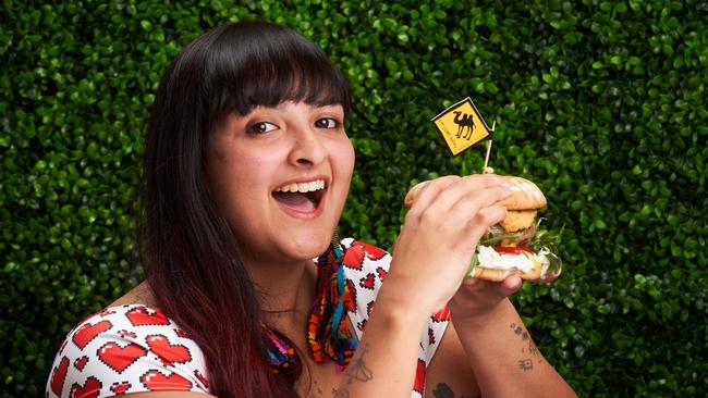 Fatema Sitabkhan with the Camel Burger at Prairie on O’Connell in North Adelaide. Picture: MATT LOXTON