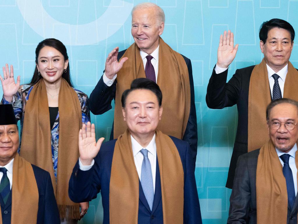 The annual “family photo” at APEC was delayed slightly as US President Joe Biden arrived several minutes late. Picture: AFP