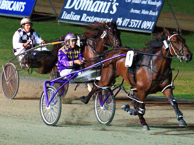 Harness racing at Parkland Showgrounds, Southport. Winner of the 2011 QBred Breeders Classic Final for 3 year old Fillies, Forever Gold, driven by Kylie Rasmussen.