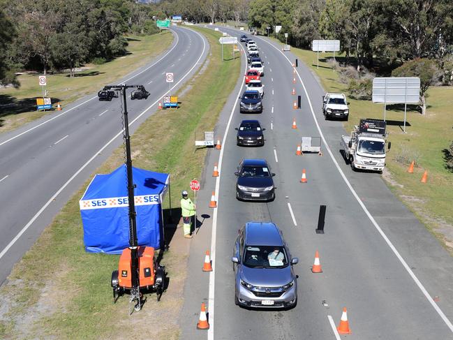 Queensland Police stop and inspect all vehilces attempting to enter Queensland at Tugun outside the Gold Coast Airport  border crossing.Photo Scott Powick Newscorp