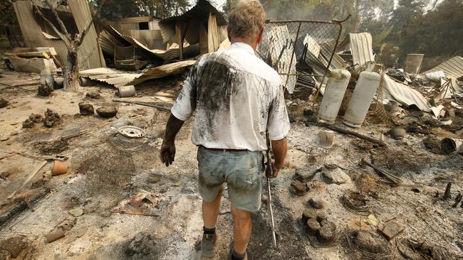 Rex Newton has the shirt on his back and little else after the fire. Picture: Darrian Traynor/Getty Images