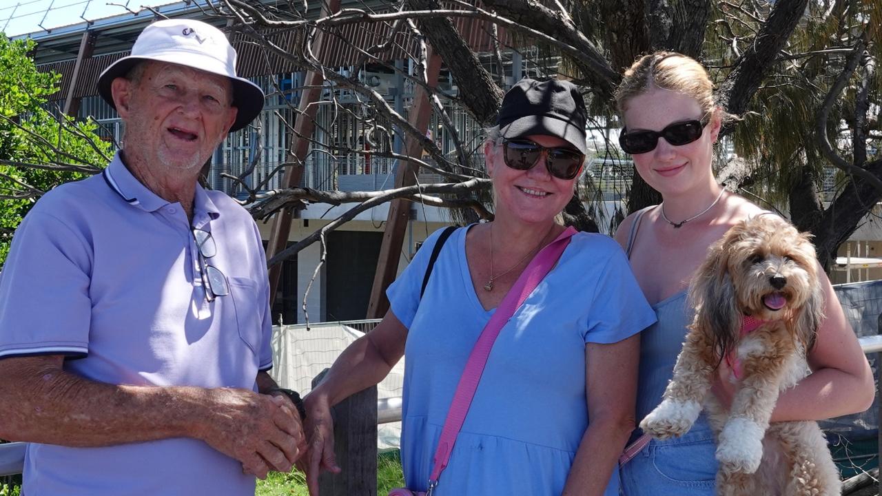 Coffs Harbour locals Graham, Amanda and Amelia Miller with Nutmeg Cinnamon Coffee, a Shih tzu cross poodle. Picture: Chris Knight