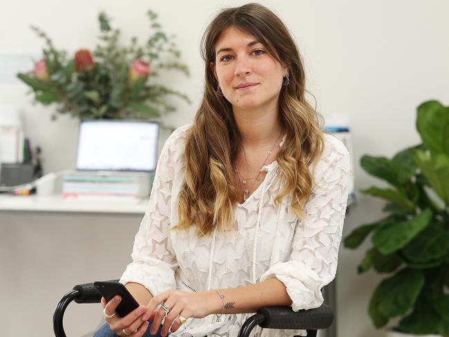 Felicity Billa, 28, regularly checks her phone at work. Picture: Danny Aarons