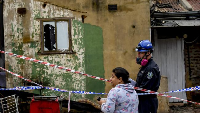 Firefighters were first called to a house fire at Gray St, on the corner of Waymouth St in the CBD, about 8.15pm on Tuesday. Picture: Roy Vandervegt